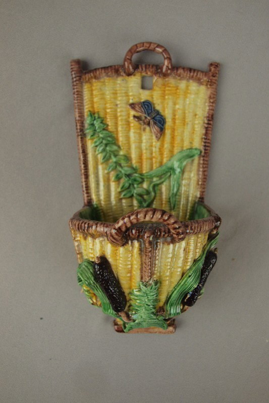 Portugal Palissy style basket wall pocket with but: Portugal Palissy style basket wall pocket with butterfly and bullrushes, 9"h, 4 1/2"w, rope handle restored and professional repair to tips