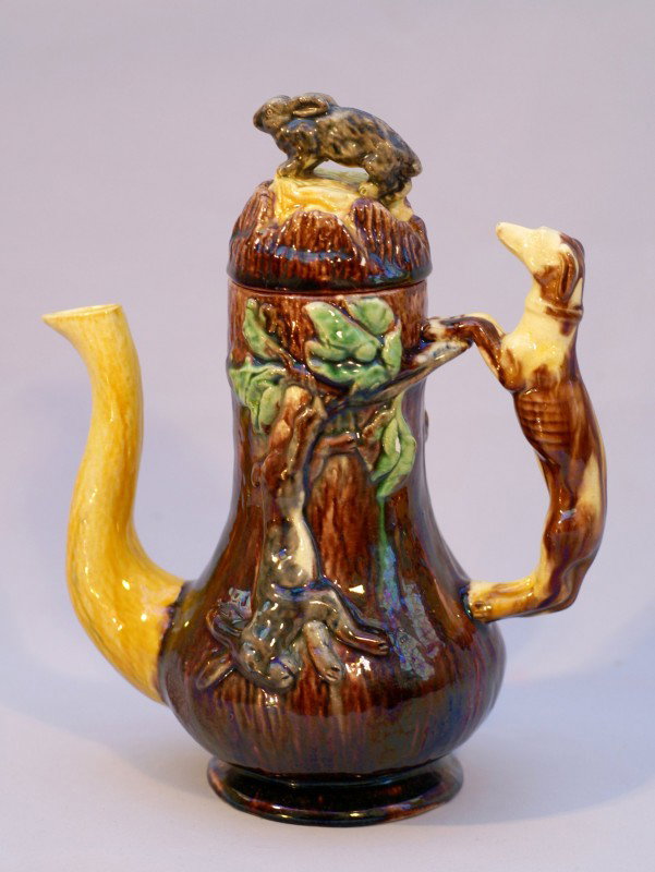Portugal Mafra majolica "Hunting" coffee pot with: Portugal Mafra majolica "Hunting" coffee pot with hound handle and rabbit on lid, 7", very rare form, professional repair to rabbit finial