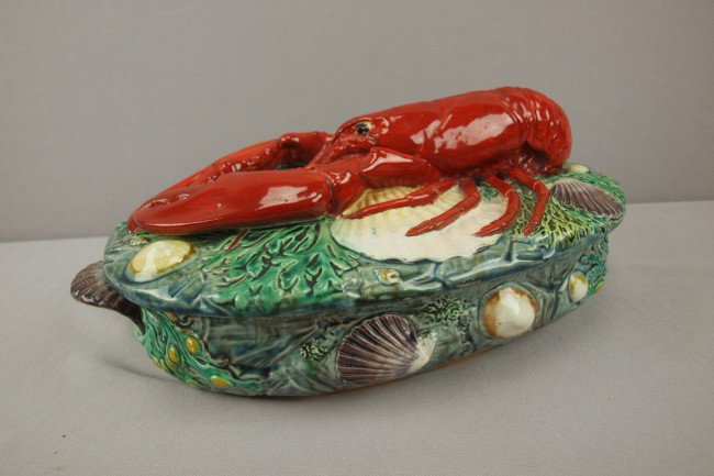 MINTON majolica covered lobster tureen with large: MINTON majolica covered lobster tureen with large lobster on bed of shells and seaweed on cover, base also decorated with seaweed and shells with shell handles, 13 1/2"l, shape no. 1523, great color a