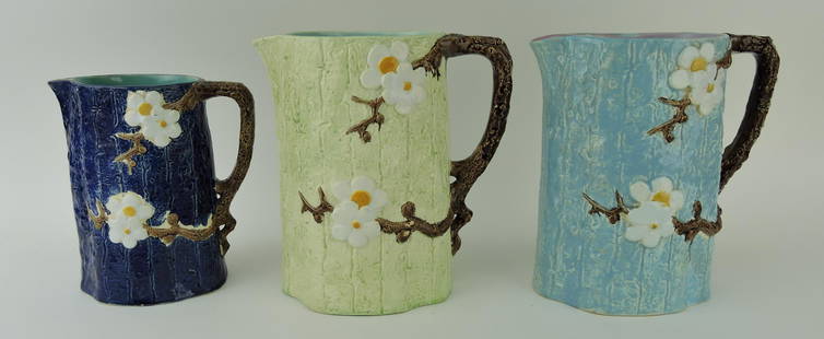 Holdcroft majolica trio of dogwood: jugs, 1 - 7", 2 - 8", various condition