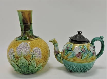 Majolica bottle carafe (hairline, rim: chip under glaze), and pewter topped floral teapot