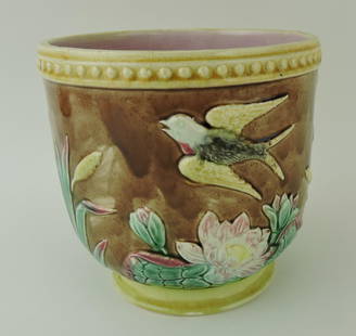 Majolica bird in flight and water lily: cachepot, 7 1/2"h