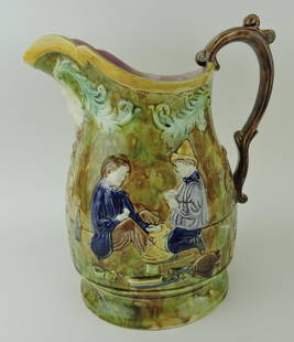 Majolica massive jug with scene of two: men playing games on each side, "Old Man Winter" spout, professional rim repair; 12 1/2"