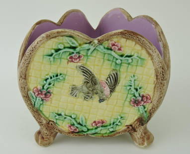 Majolica tri-cornered footed cachepot: with bird on wicker ground, 6 1/2"