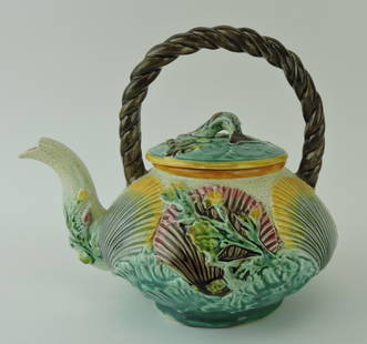 Majolica tea kettle with shells, coral,: and seaweed, rope handle and fish on lid, 8 1/2"