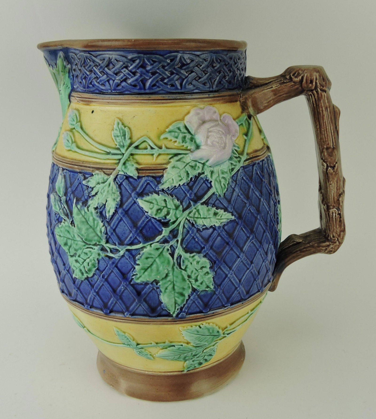 Majolica cobalt wicker and wild rose: jug, 9 1/2"; Betsy & Rick Porter Collection