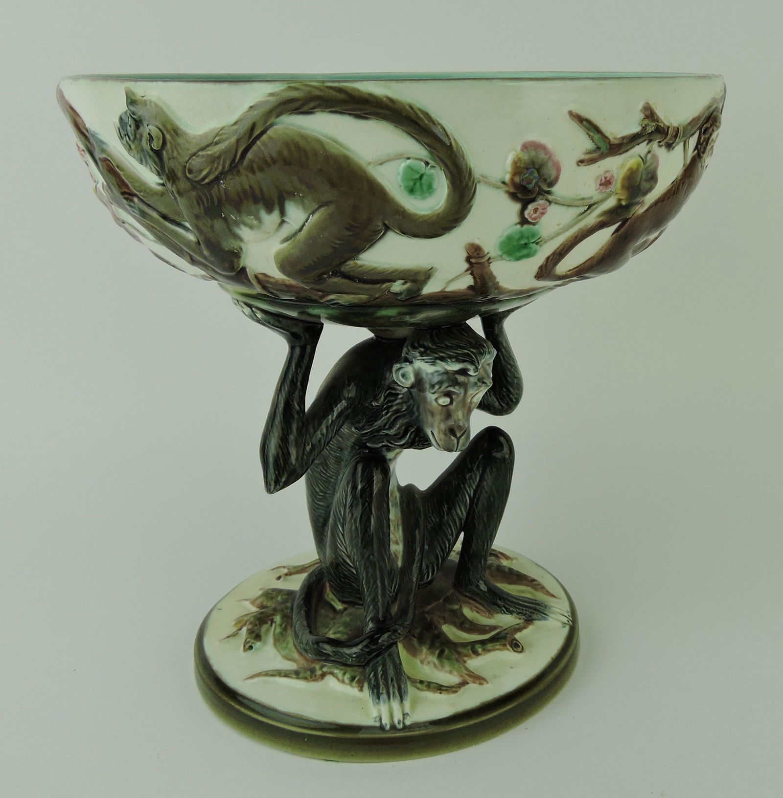 Wedgwood majolica Argenta compote: with monkey supporting bowl and four frolicking monkeys in relief on bowl, 10"h, 9"d