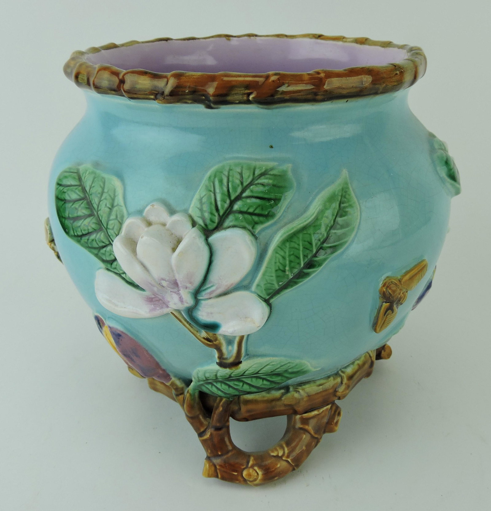 George Jones majolica magnolia and: bee bamboo footed cachepot, 9 1/2"h, 9 1/2"w