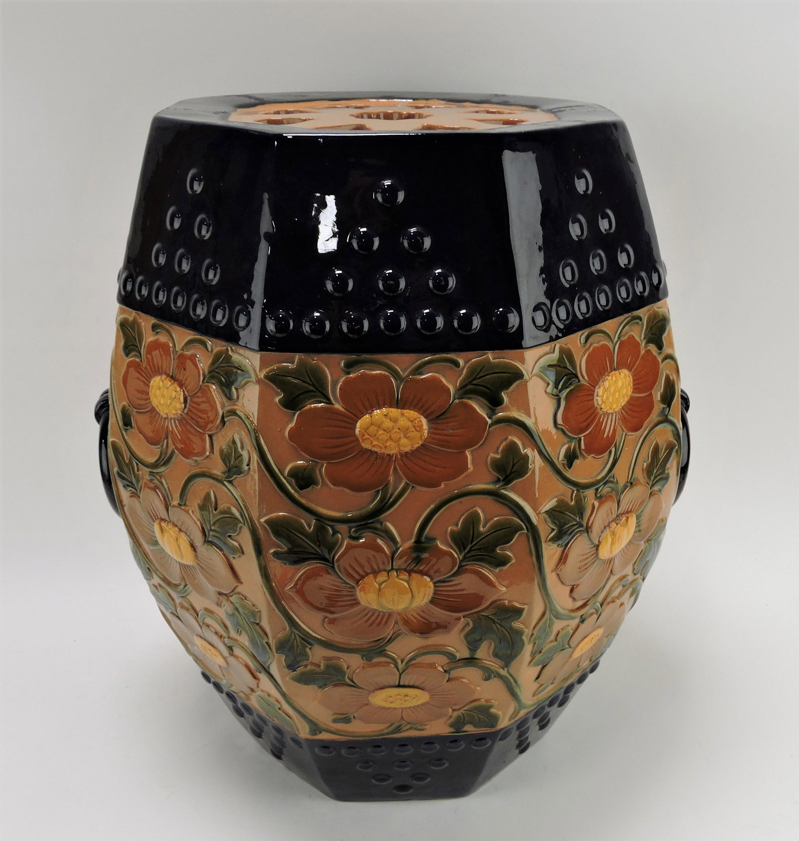 Minton majolica hexagonal barrel: garden seat with ring handles, pierced heart seat, and lotus flower decor, #2212, 17 1/2", minor surface wear to seat