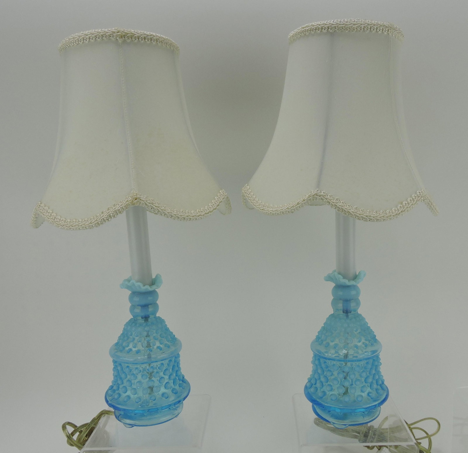 Fenton blue opalescent hobnail pair: of dresser lamps