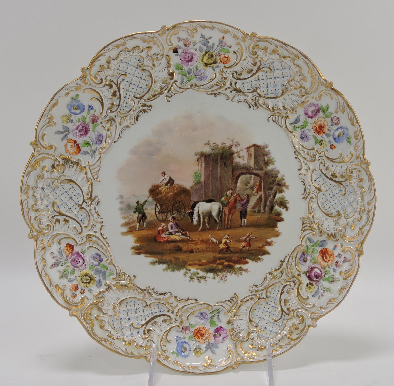 Meissen 11 1/2" tray with scenic center: and embossed floral border with gold