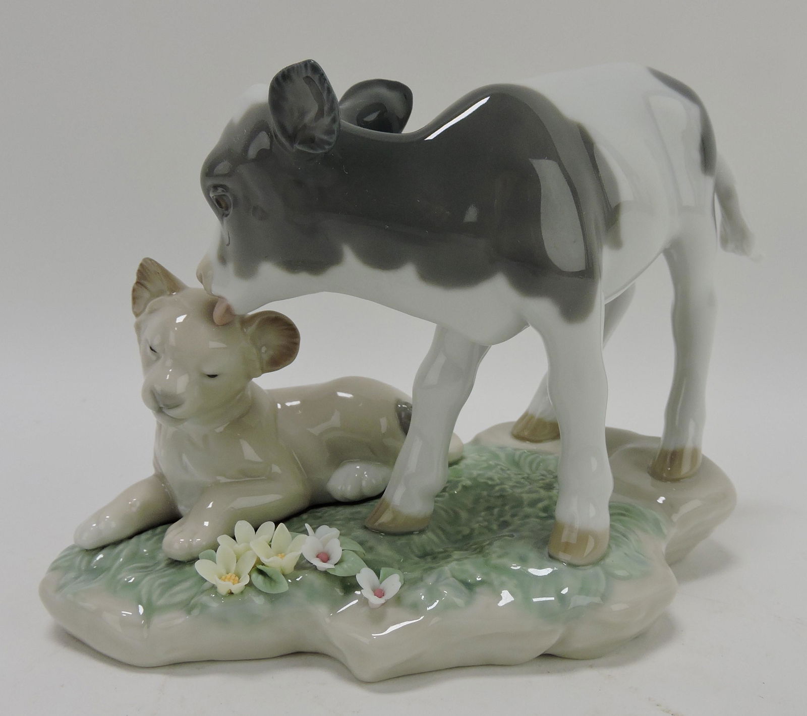 Lladro figure of calf with young lion, 4" (1 of 1)