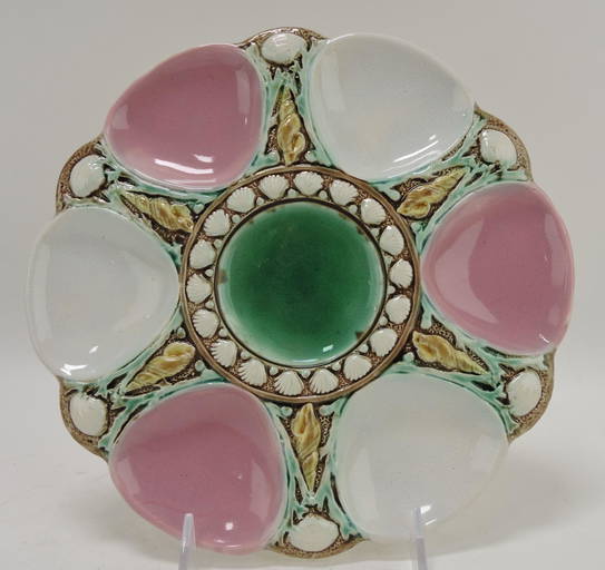 Majolica 6 well oyster plate with (1582) on May 27, 2022 Strawser Auction Group in IN