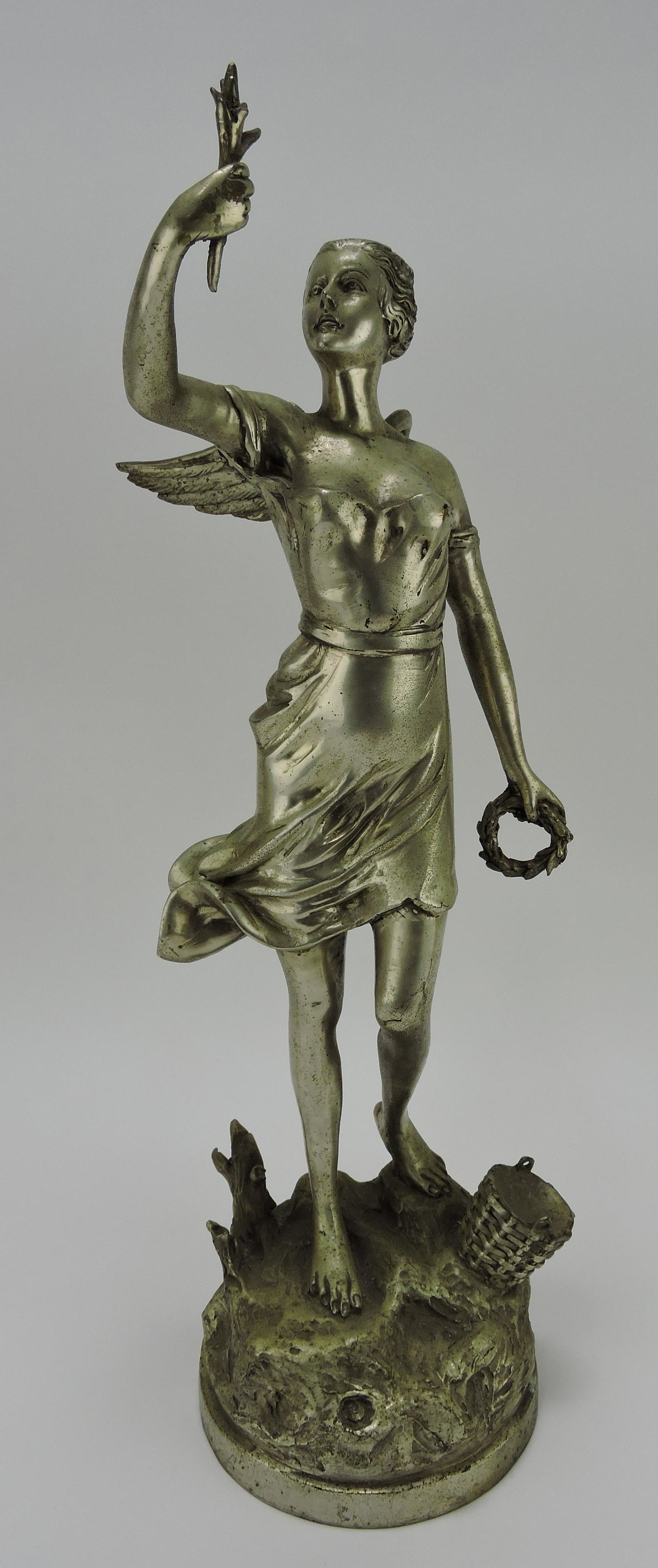 Silver gilted bronze 1936 Olympic: statue of winged lady with torch and laurel wreath, 20 1/2"