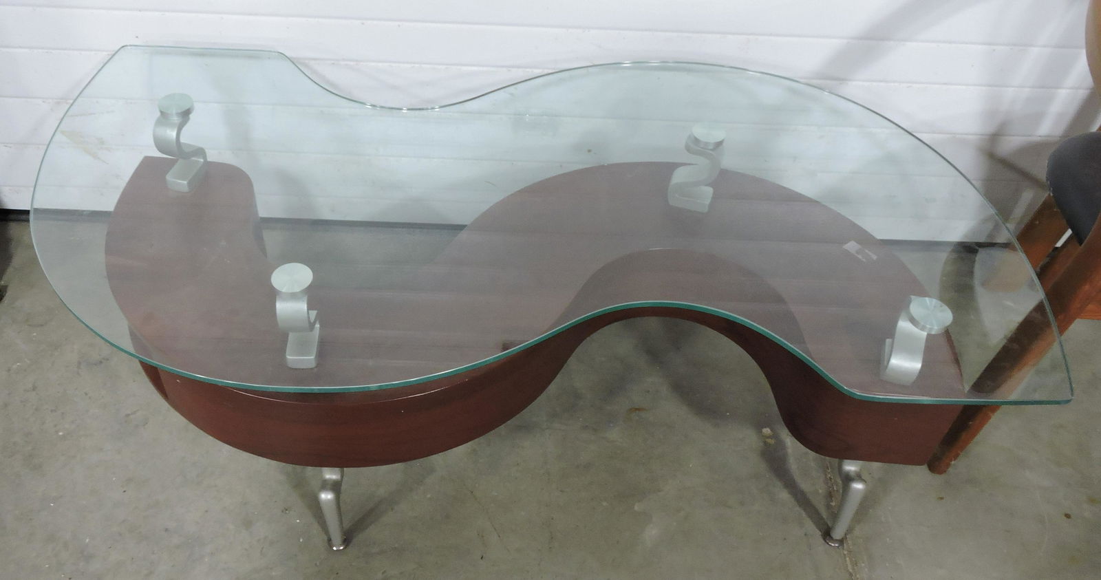 MCM Global Furniture glass top: "S" shaped coffee table with tambour opening doors on each end, 18"h, 50"w, 26"d