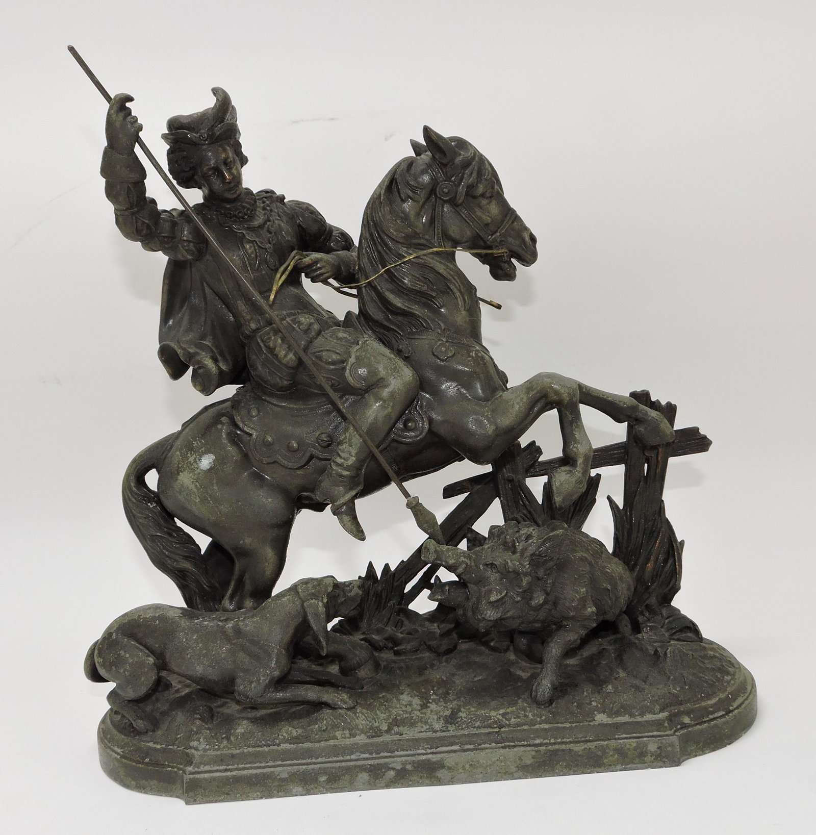 Spelter statue of hunter with spear: on horse with hunting dog and wild boar, 12"