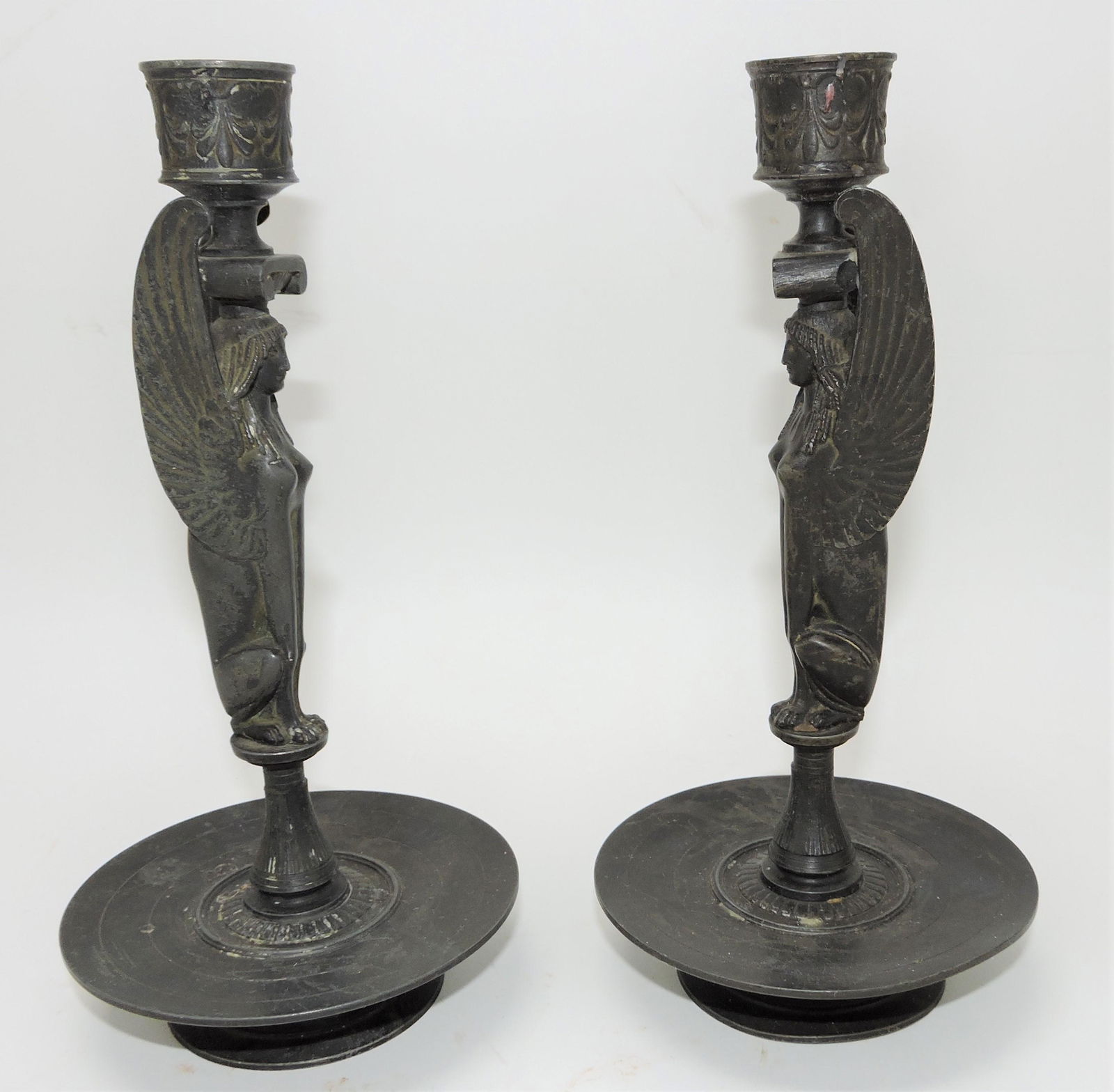 Bronze pair of sphynx candle holders, (1 of 2)