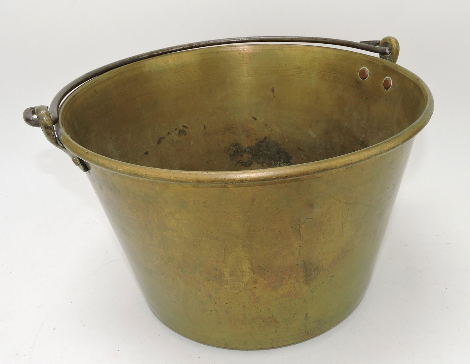 Early brass bucket with iron figural (1 of 1)