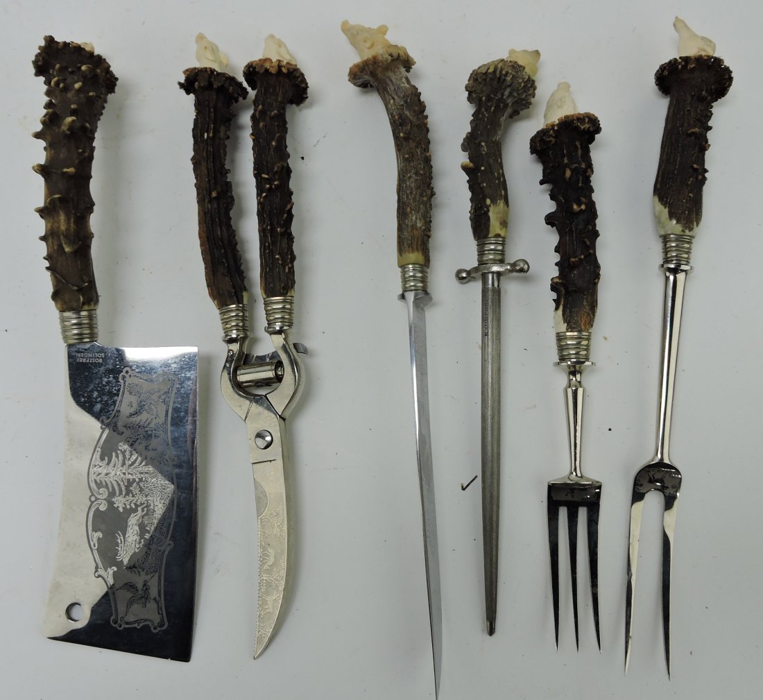 Stag handled cutlery set with carved (1 of 2)