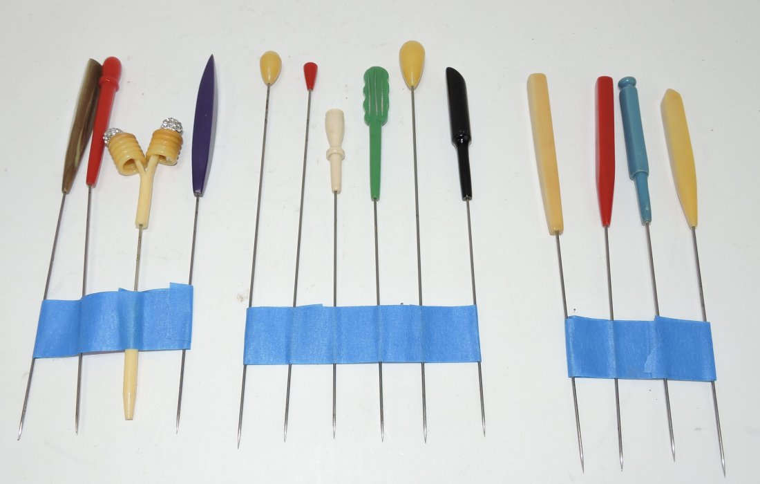 Lot of 14 Bakelite hat pins: .