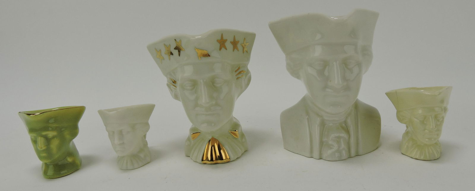 Fiesta type lot of 5 World's Fair: George Washington creamers and toothpick holder, hairline to one