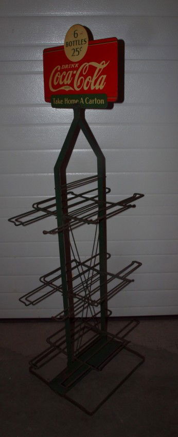 Coca Cola 6 pack store display stand with 2 sided: Coca Cola 6 pack store display stand with 2 sided sign "6 Bottles for 25 cents, Take Home a Carton"