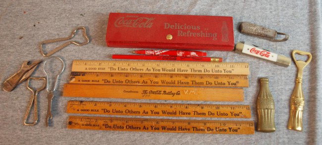 Coca Cola lot of novelty advertising items - bottl: Coca Cola lot of novelty advertising items - bottle openers, pocket knives, rulers, pens and pencils