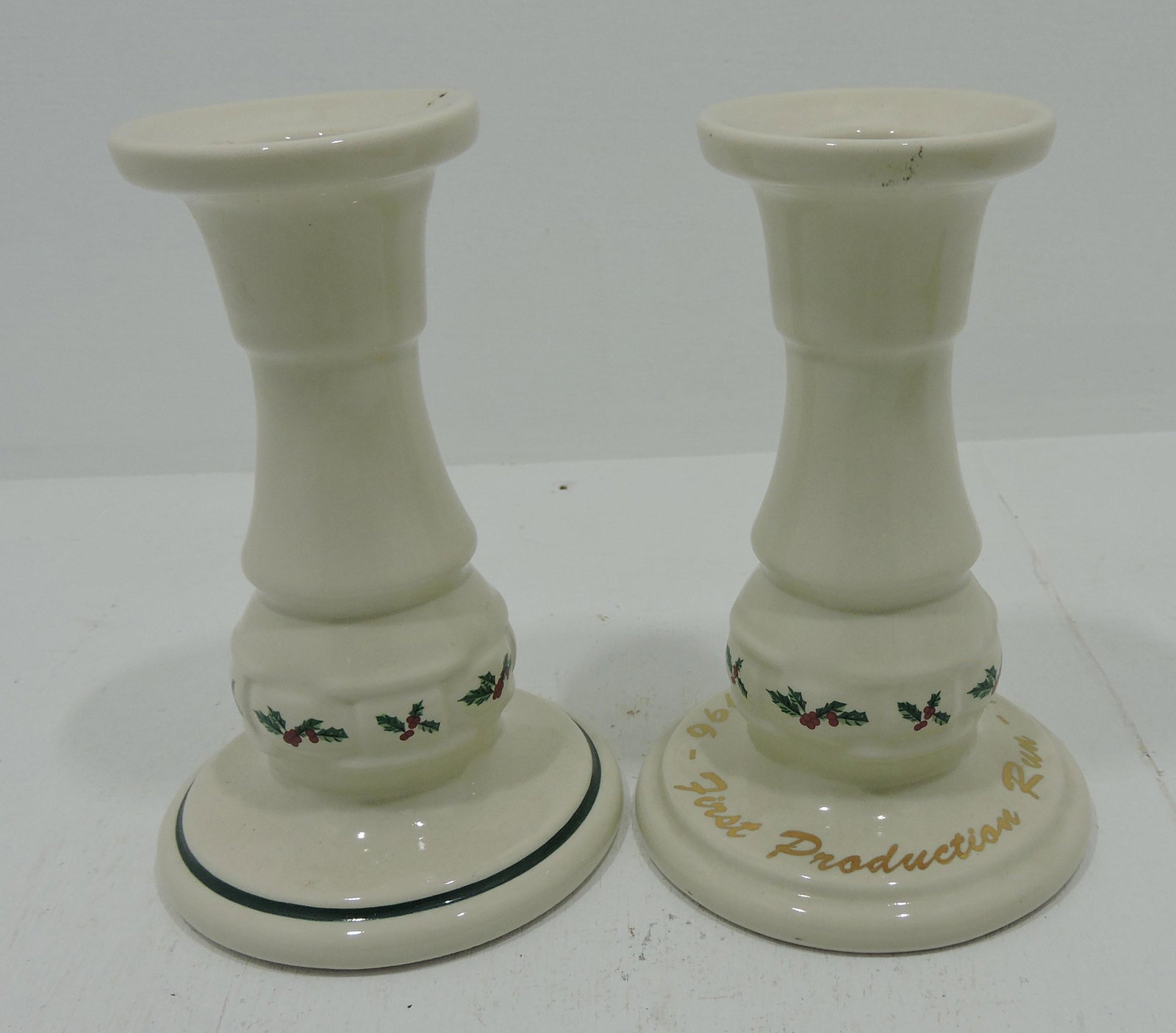 Hall China Longaberger pair of holly: and berry candle holders, one 'First Production Run April 12, 1996' with design drawing