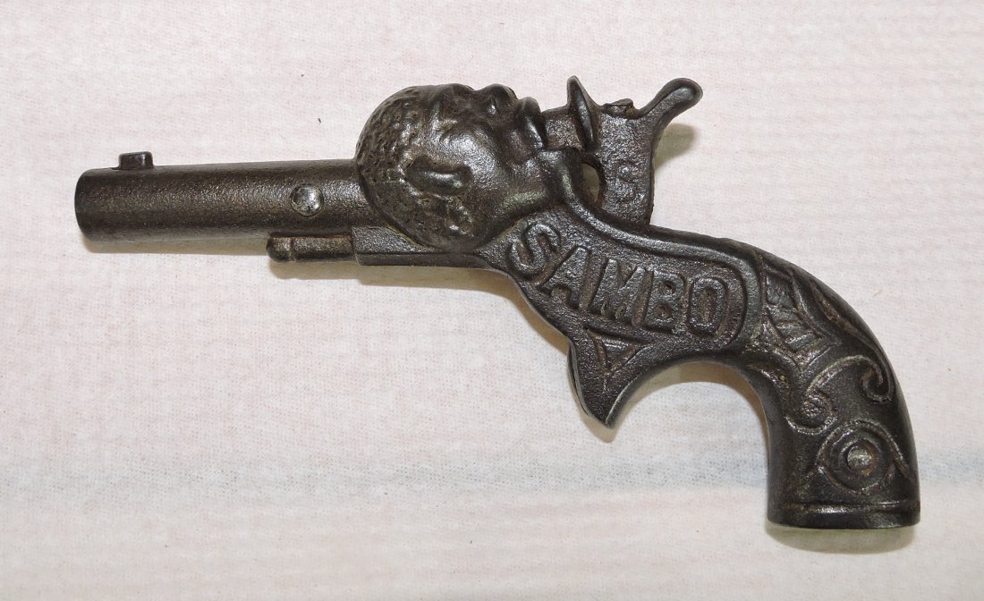 Black Americana cast iron 'Sambo' cap gun: dated June of 1887 and 1890, 4 3/4", made by Ives