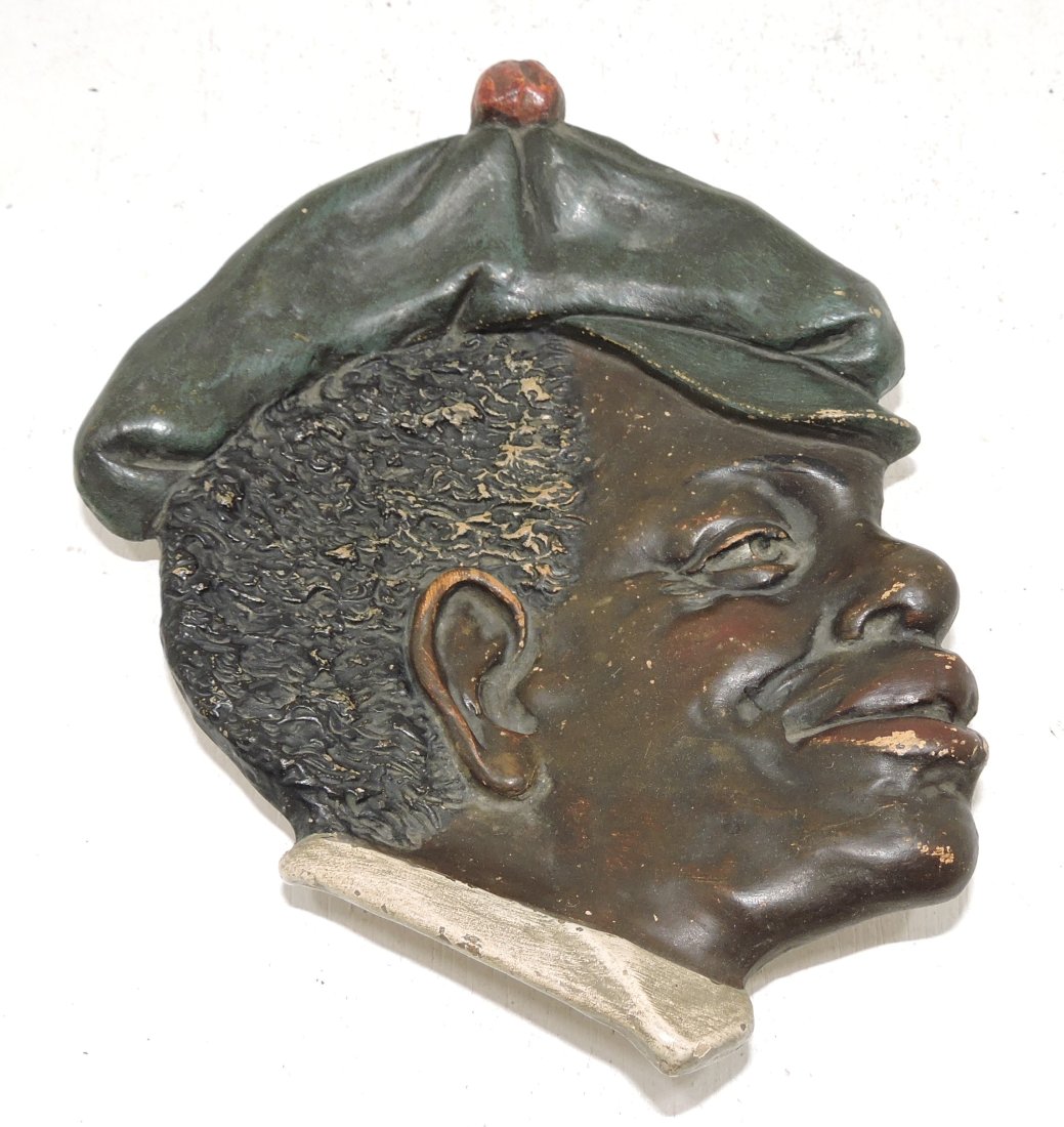 Black Americana terra cotta ashtray,: 7", signed J.M.