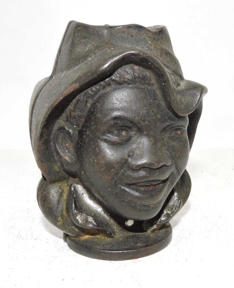 Black Americana cast iron two face: bank, 4"