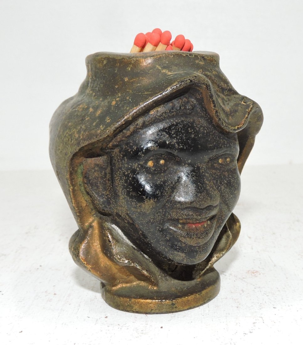 Black Americana cast iron two face: match holder, 3"