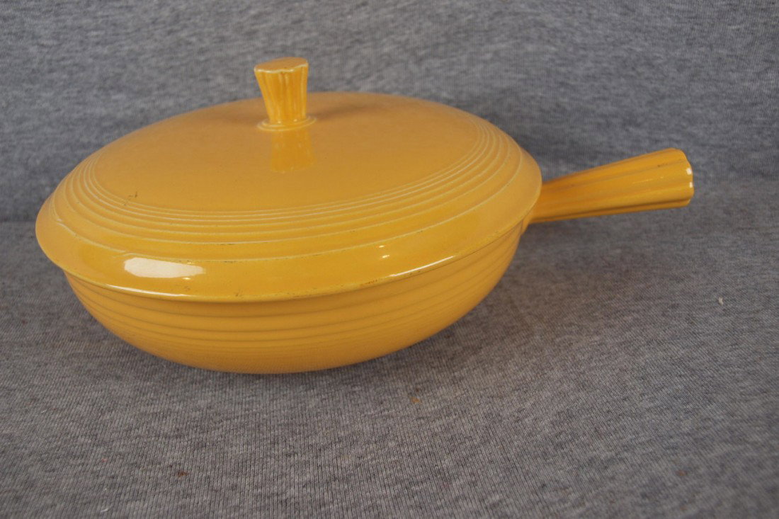 Fiesta yellow French casserole , nick to finial : Fiesta yellow French casserole , nick to finial