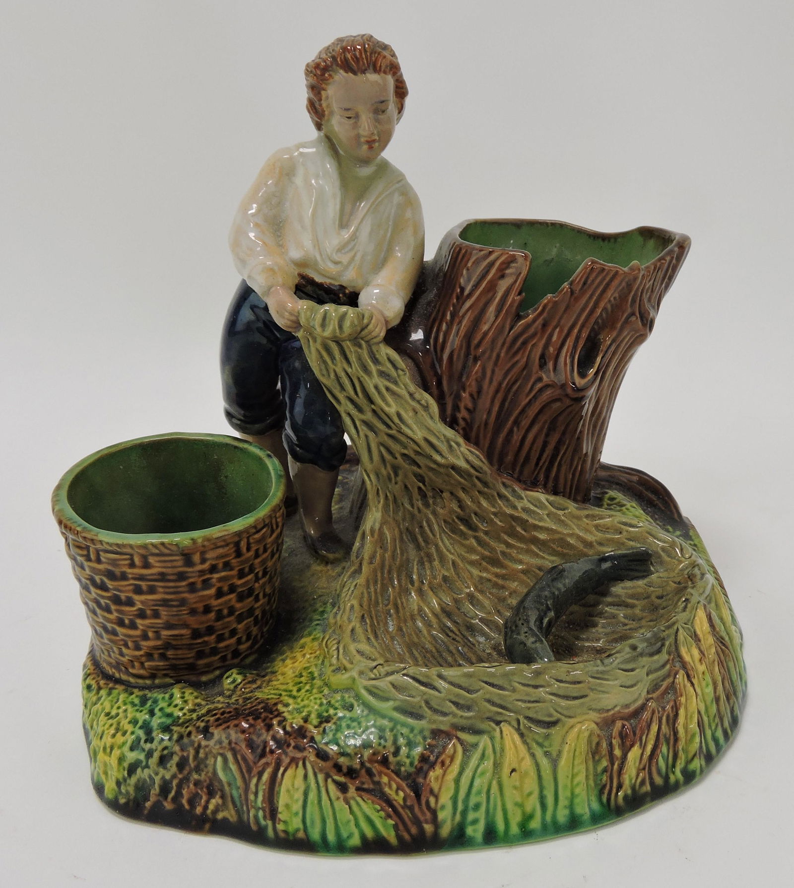 Wilhelm Schiller & Son majolica fisherman: match striker, 6 1/2"