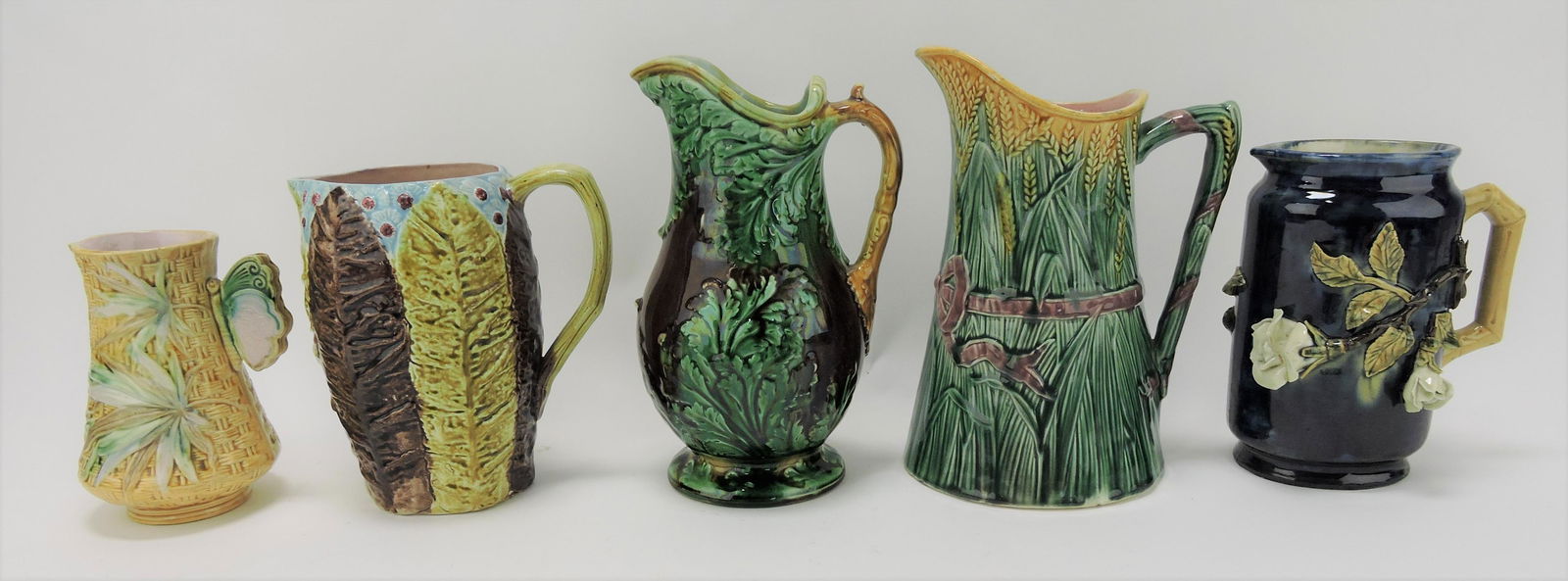 Majolica lot of 5 pitchers, 6 to 9", various (1 of 1)