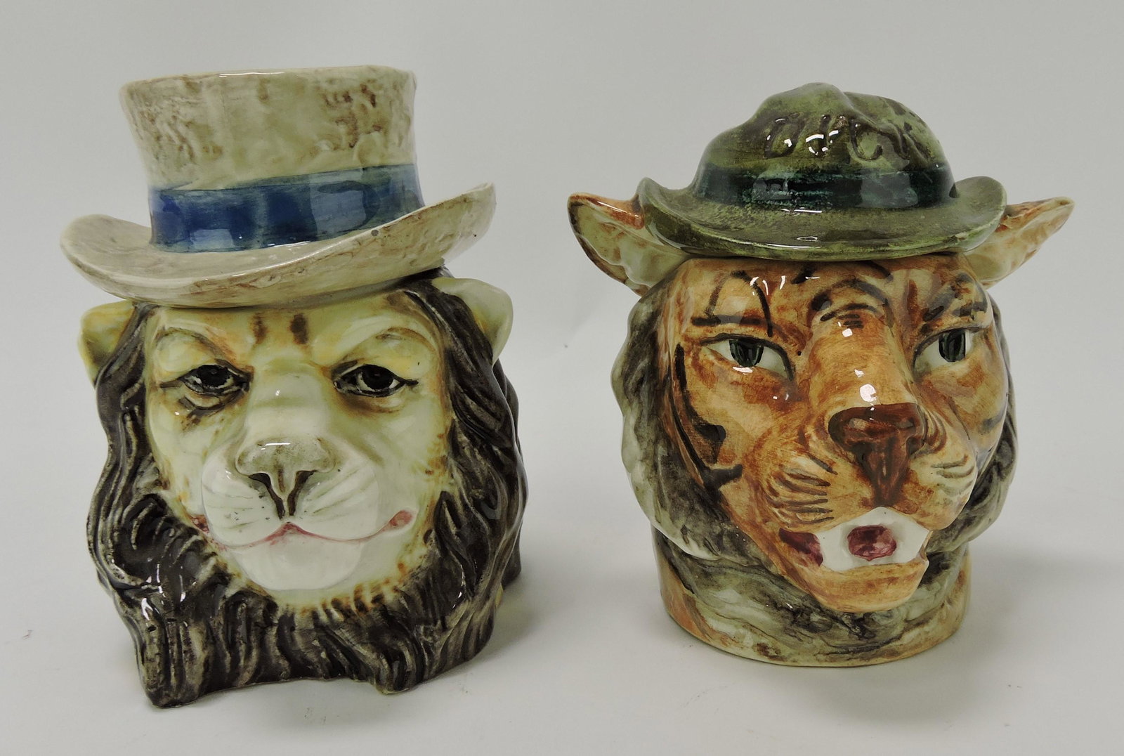 Majolica lion and tiger head humidors, 5": .