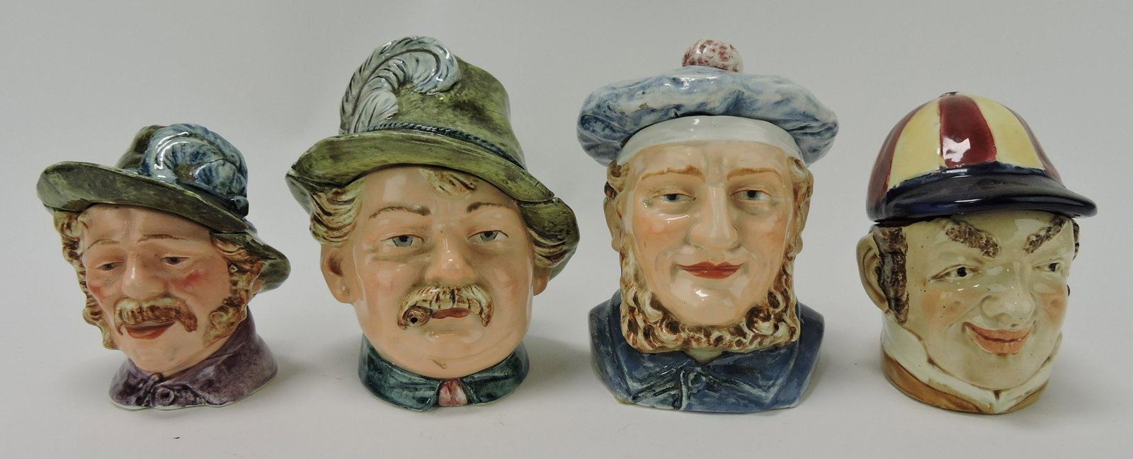 Majolica lot of 4 men's head humidors,: various condition
