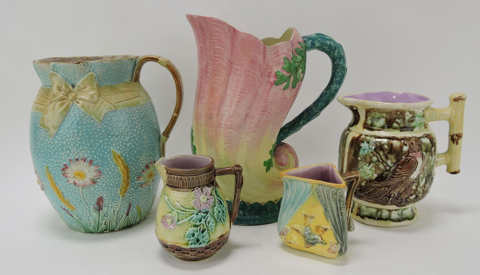 Majolica lot of 5 pitchers/creamers, various: condition