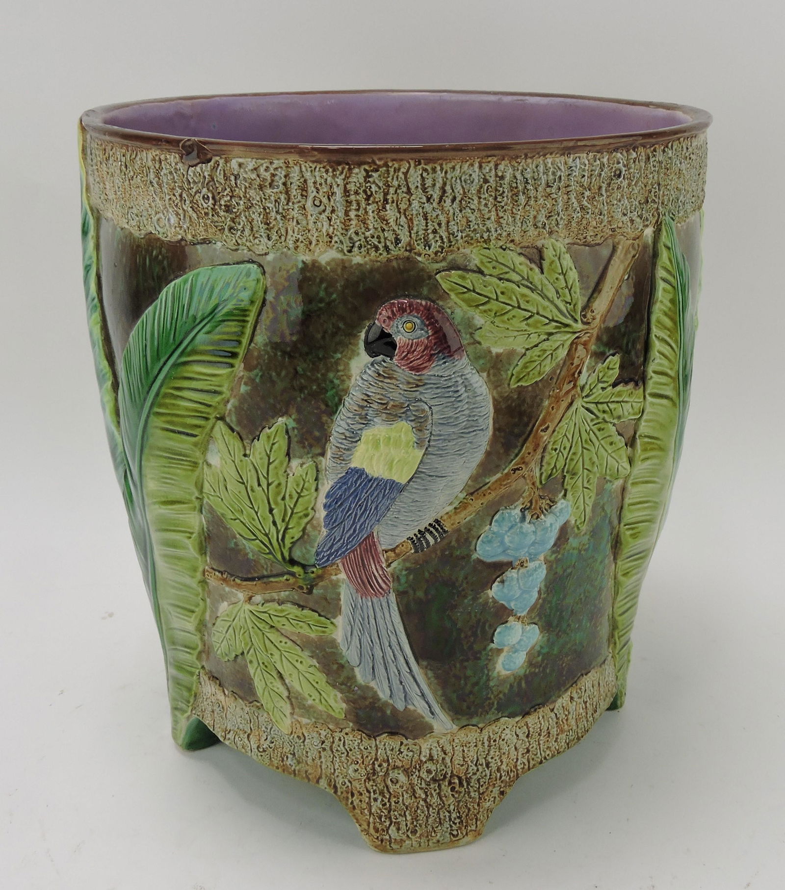 Holdcroft majolica jardiniere with: parrot on branch, 13"h, 11 1/2"d, rim chip