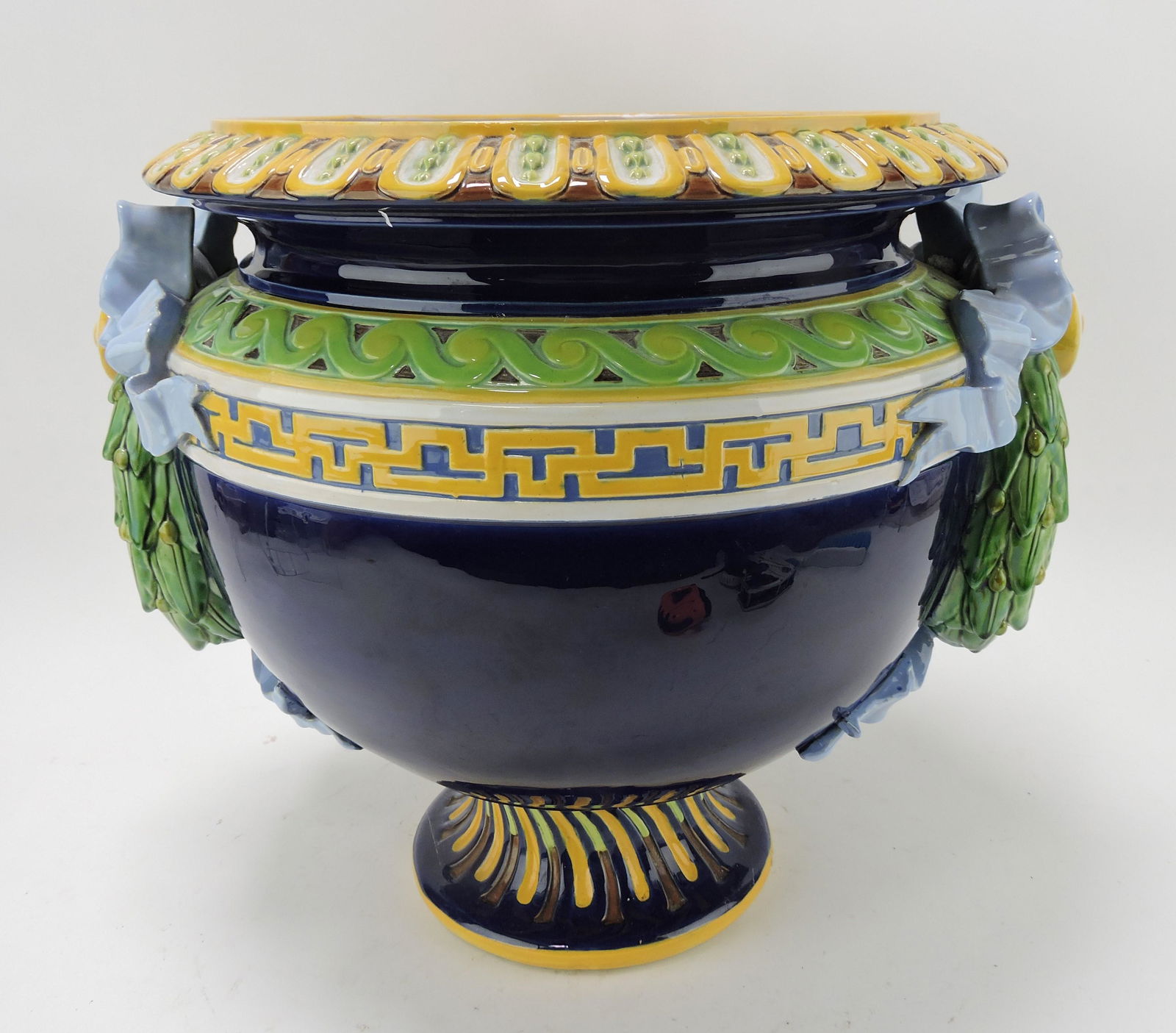 Minton majolica cobalt jardiniere with: laurel wreath handles, shape no. 766, 15"h, 17"w
