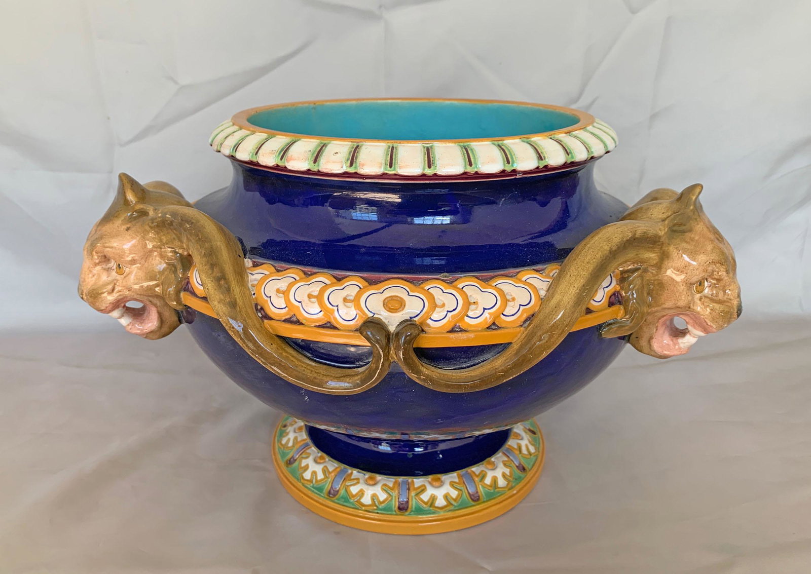 Minton majolica lion head cobalt jardiniere: with three lions heads around rim, 8"h, 12"w