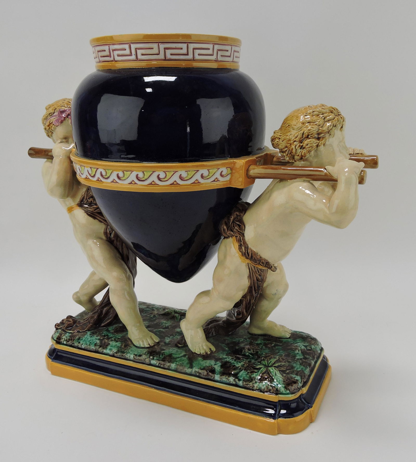 Minton majolica cherubs amphora vase,: designed by Carrier Belleuse, shape no. 1517, 14"h, 16"l