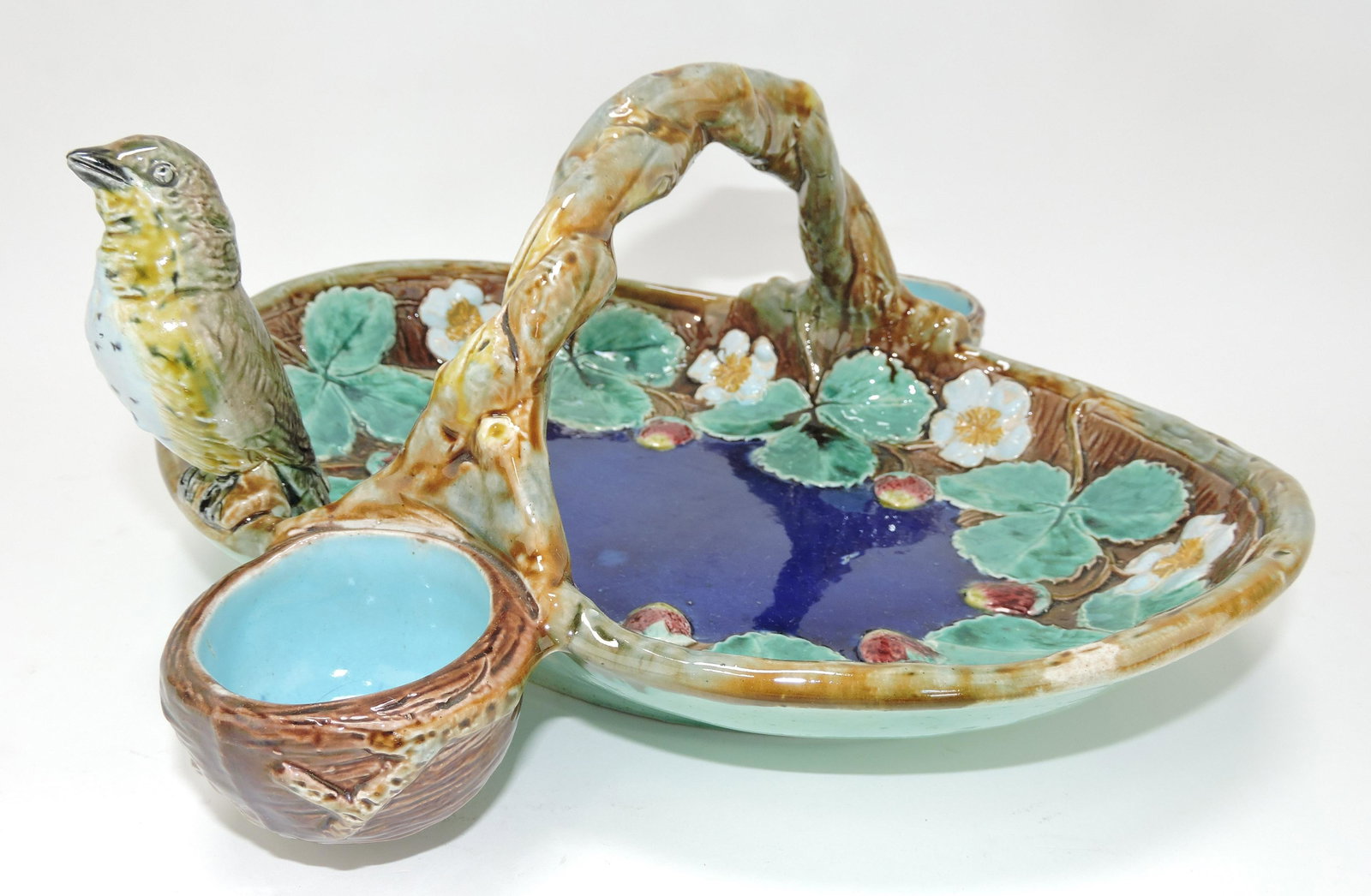 Holdcroft majolica strawberry basket: with bird on rim, 11"w