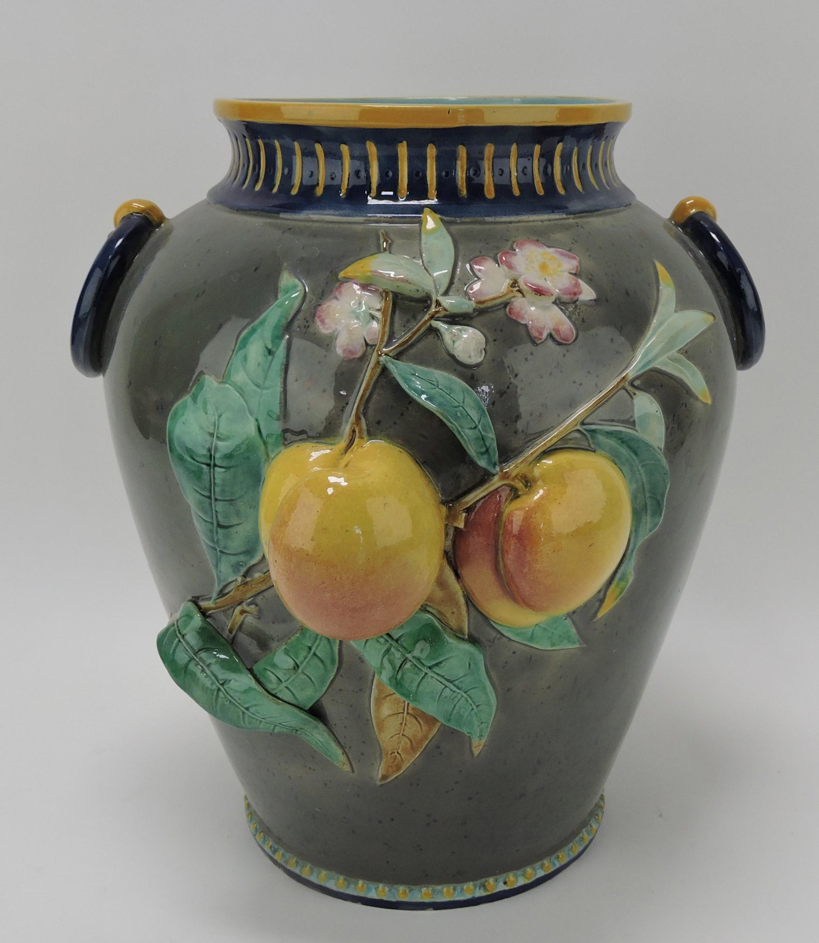 T.C. Brown Westfield Moore & Co: majolica vase with peaches and ring handles, professional hairline repair, 12"