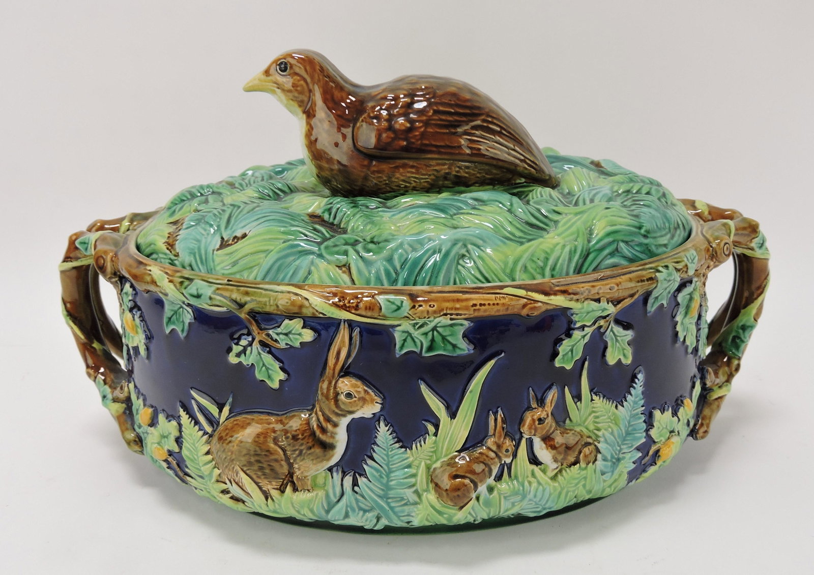 George Jones majolica cobalt partridge: game dish, 12 1/2"l, 7 1/2"h, professional rim repair to lid
