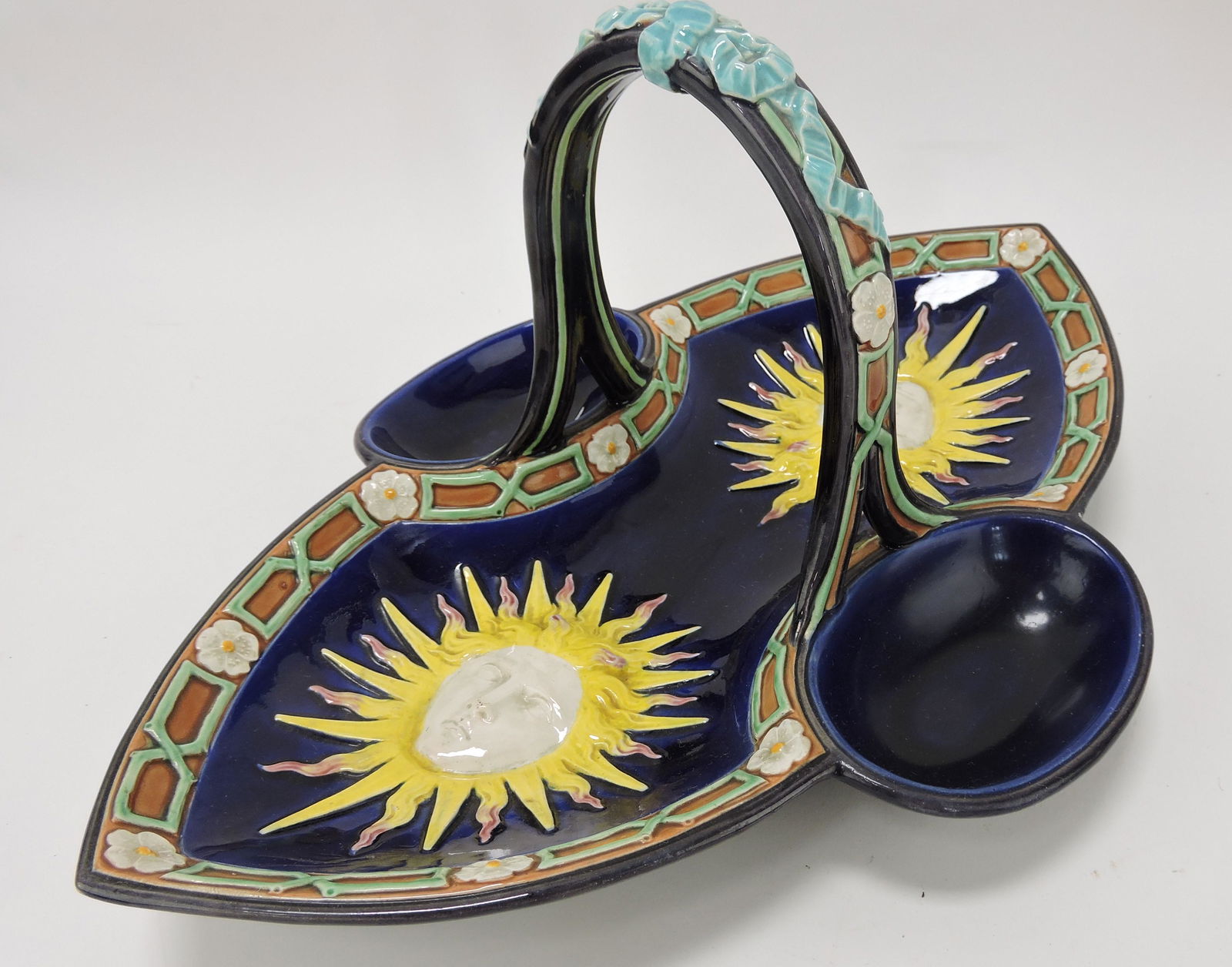 Wedgwood majolica cobalt basket: with sun goddess mask, professional rim repair, 15"l, 7"h