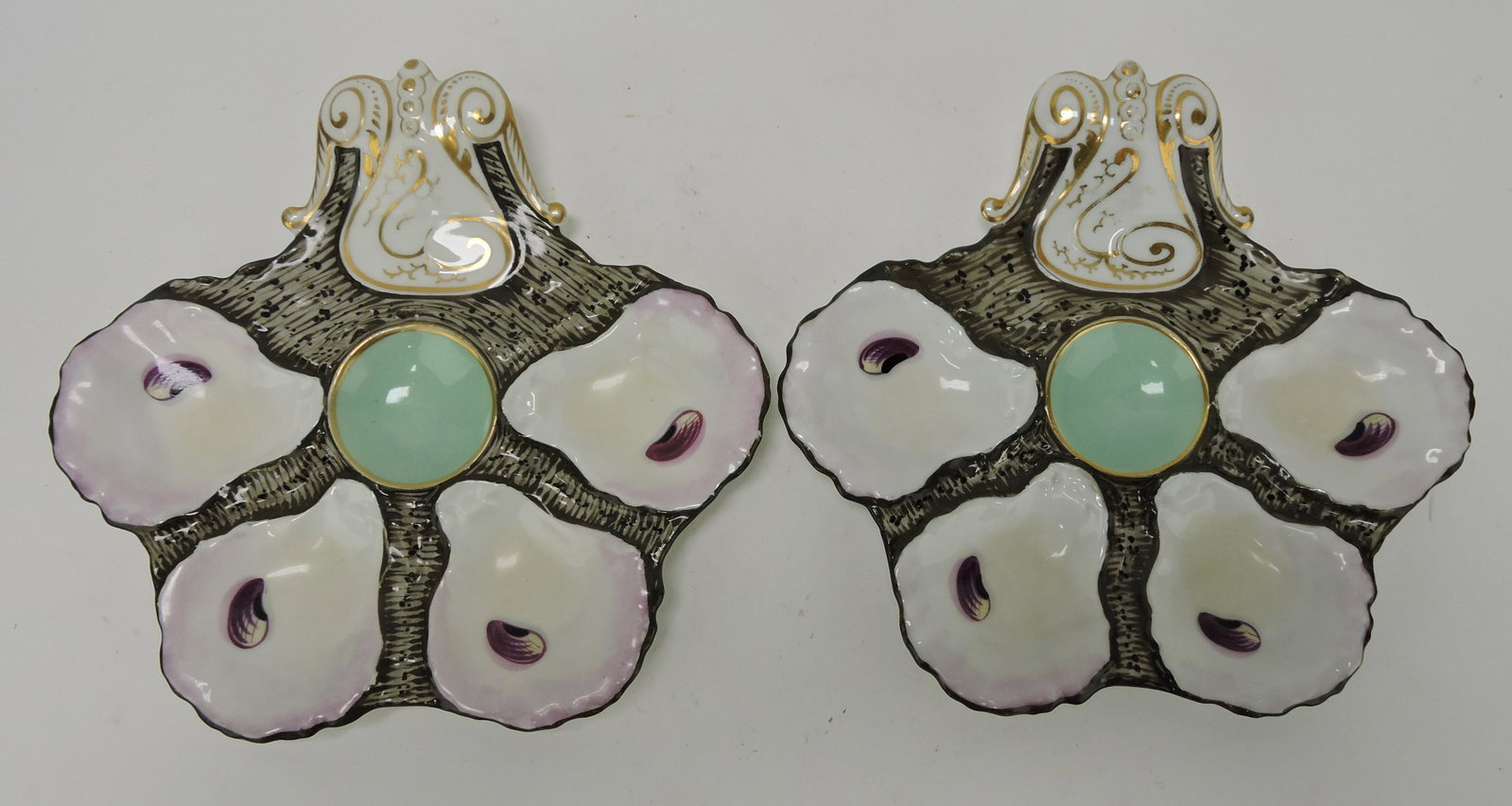 Pair J.W. Boteler 9" four well oyster: plates