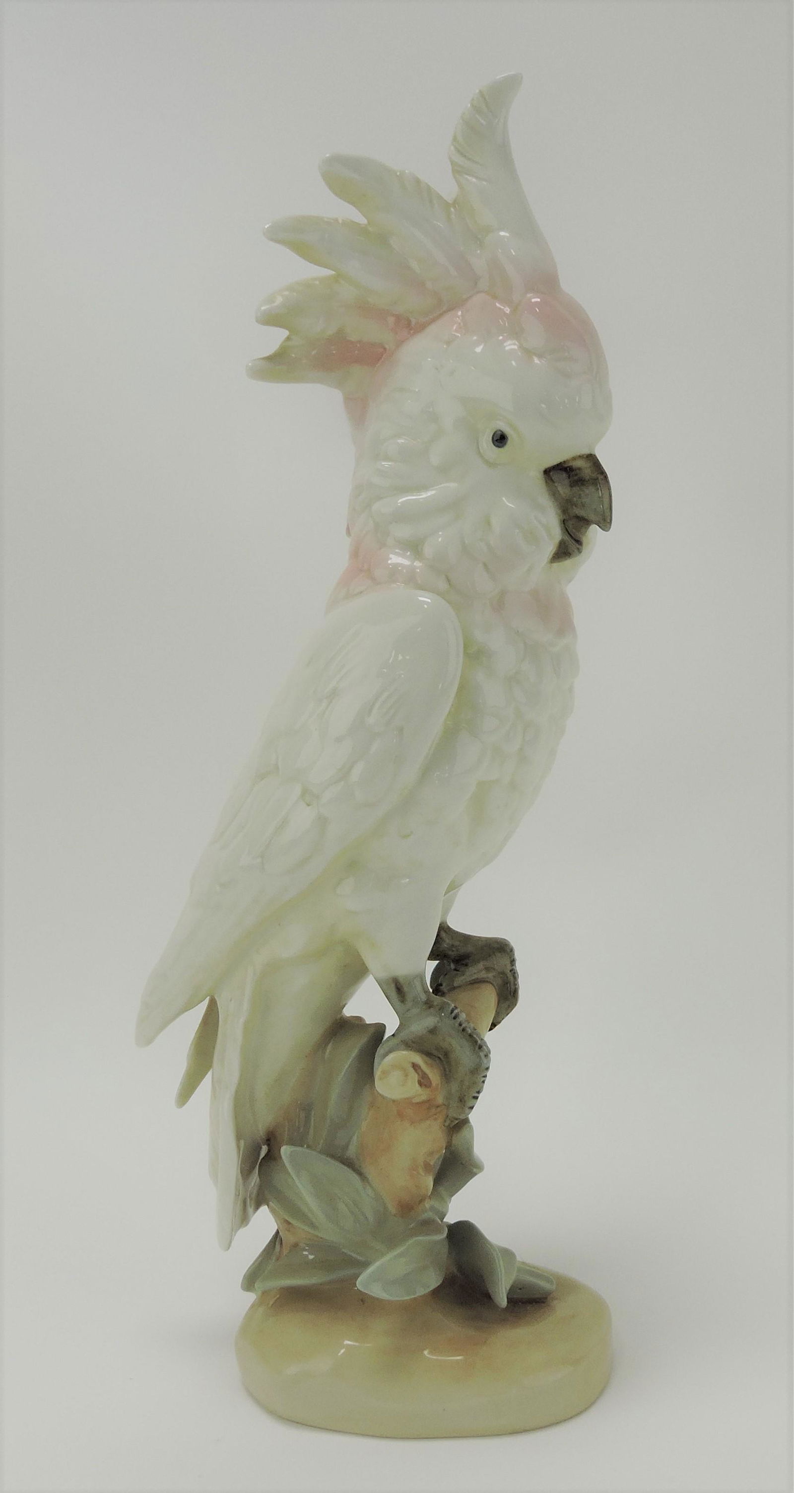 Royal Dux cockatoo on branch figure, (1 of 2)