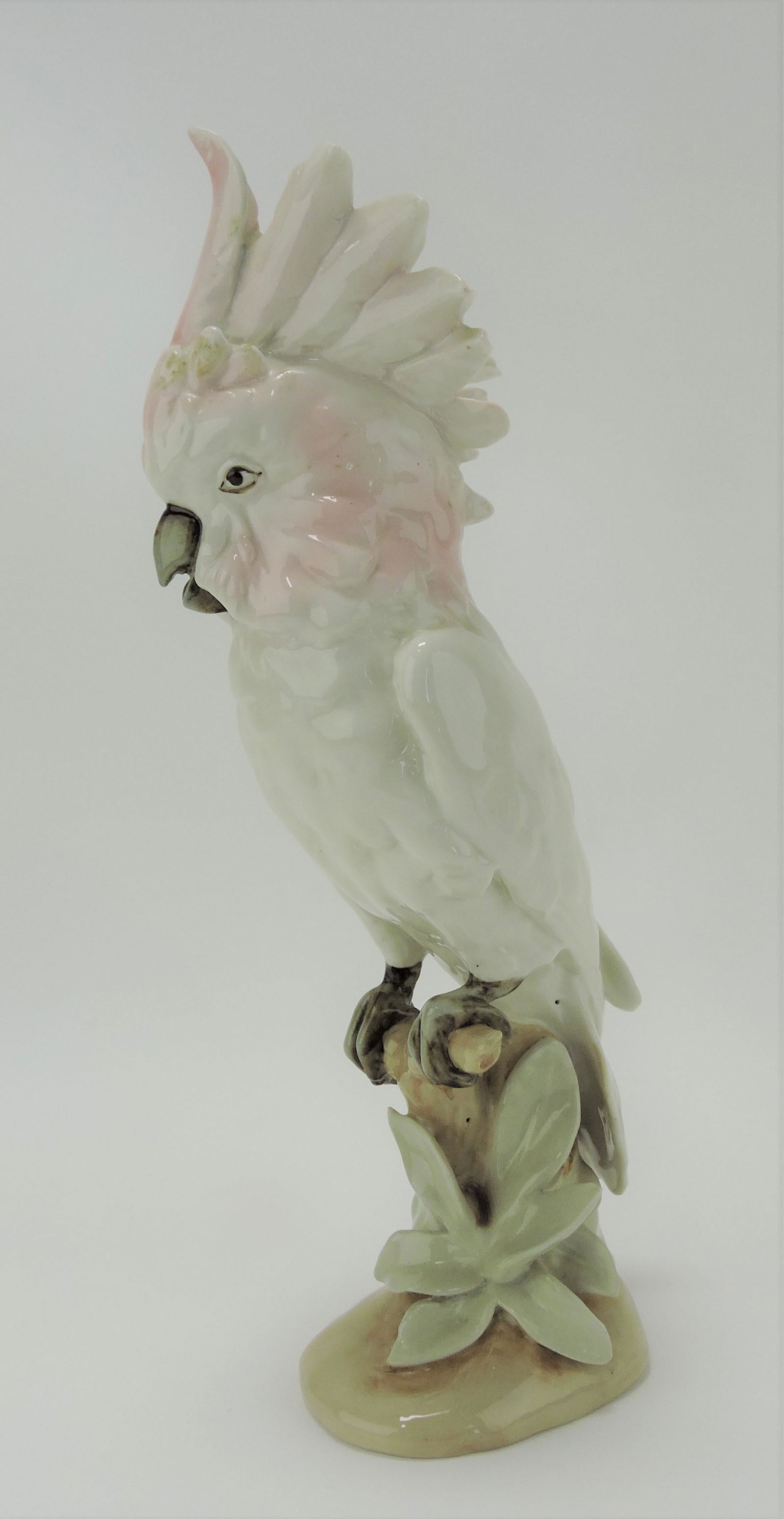 Royal Dux cockatoo on branch figure, (1 of 2)