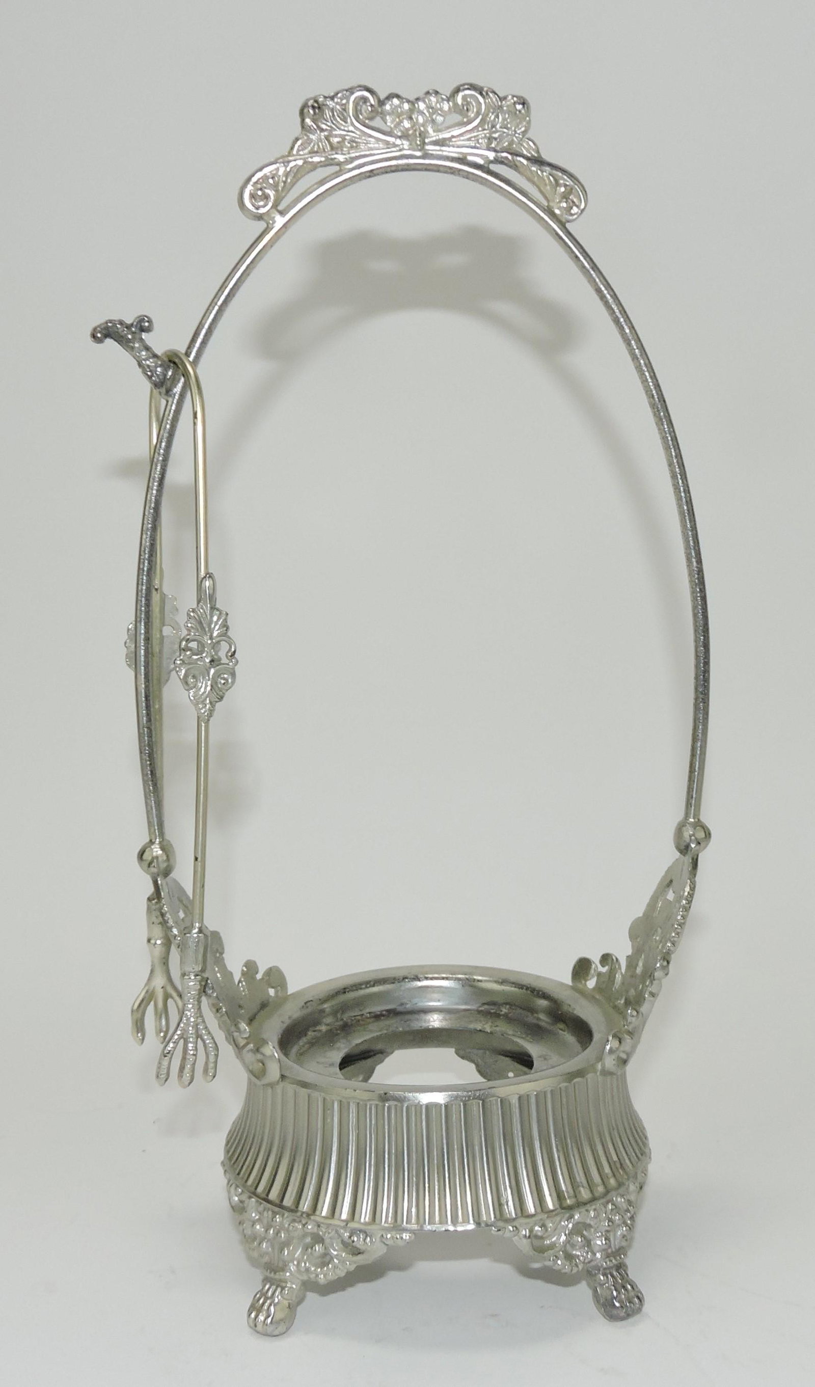 Silverplate pickle castor frame with: tongs